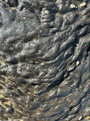 Naklejka premium Solidified black tar up close