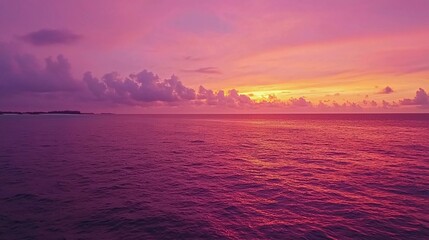 Colorful sunset over the ocean on the beautiful Maldives