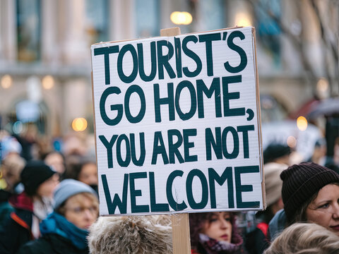 Demonstration against overtourism, sign with written “Tourist's Go Home, You are not Welcome”