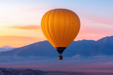 Obraz premium A stunning hot air balloon floats gracefully against a colorful sunset, showcasing the beauty of aerial exploration and adventure.