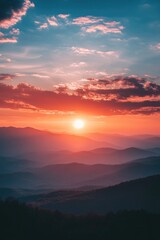 Obraz premium Sunset over distant mountains