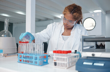Scientist, test tube and science in lab for analysis, biotechnology and cancer research...