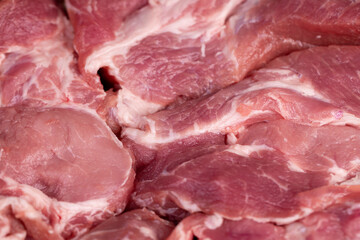 a sliced piece of pork meat from the neck