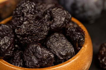 ripe purple plums and dried plums