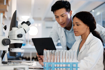 Scientists, tablet and collaboration in lab for research, biotechnology and telehealth development....