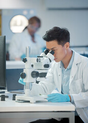 Asian man, science and microscope at laboratory for scientific research, trial and investigation....