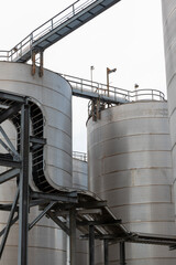 Steel tanks with pipes and stairs