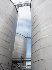 Huge steel storage tanks on a row 