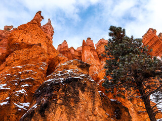 Snow scene colorful cliffs with red rock and stone in Bryce Canyon National Park