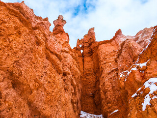 Snow scene colorful cliffs with red rock and stone in Bryce Canyon National Park