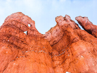 Snow scene colorful cliffs with red rock and stone in Bryce Canyon National Park