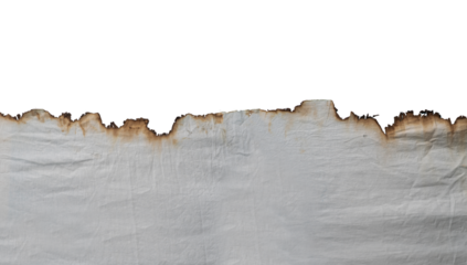 Decayed fabric with a burnt edge on an isolated background. Halloween horror background blank template with empty copy space.