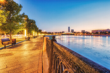 Moscow street at night on the river with bridge