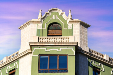 Architectural capital structure in the facade of a colonial building, Alicante, Spain