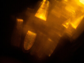 Abstract bokeh background with warm color. Digital background for design. Lens flare and light glow. Visual effect.