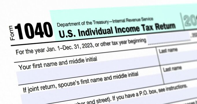 Filling tax form 1040 U.S. Individual Income Tax Return, close-up view of application form, accounting document, 