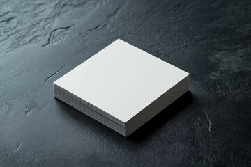 Fototapeta premium White business card mockup for branding, on dark background. Business concept