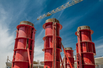 Formwork of round columns at the construction of a residential building