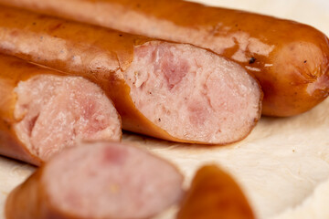 fried pork sausages on a wheat tortilla