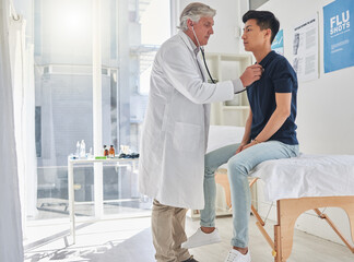 Obraz premium Doctor, patient and stethoscope in hospital for medical examination, checkup and consultation. Physician, male person and mature for health, heart beat and breathing with care or medicine in clinic