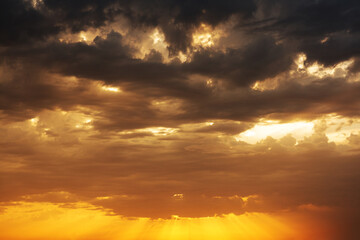 Obraz premium Beautiful sky background - Sunset Sunrise sky with light clouds and real sun. Dramatic twilight sky background