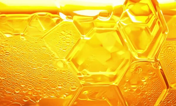 yellow liquid honey background exagon shape 4k slow motion