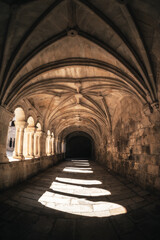 Fototapeta premium Ancient monastery in Spain with lights and darks