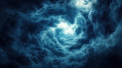 Fototapeta premium Dark Storm Clouds with Bright Light Emerging Through