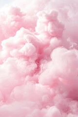 Pink pastel background with fluffy clouds.