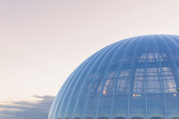 modern architecture, huge translucent dome against the sky © Evgeny