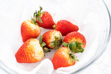 Washed and Dried Strawberries Neatly Stored in a Glass Bowl