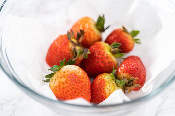 Washed and Dried Strawberries Neatly Stored in a Glass Bowl
