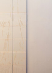 Abstract architecture. Close up of a tile wall in modern building.