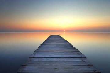 Fototapeta premium A tranquil wooden pier extends into a calm lake at sunset. The soft hues of blue and orange create a peaceful atmosphere perfect for reflection. Generative AI