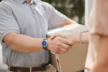 Delivery, people and handshake closeup with box at front door to house and thank you for easy service. Ecommerce, courier and person with worker shipping package for online shopping order or trust