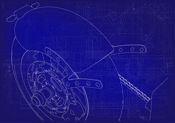 Motorcycle wheel and chain on blue background.
