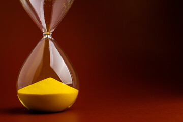 Hourglass stopwatch photo in studio The rule of limited time in work and life