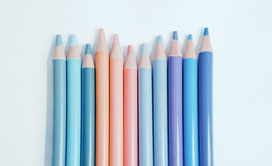Crayons on a white sheet of paper