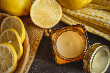 Candle, lemons and a book, summer mood