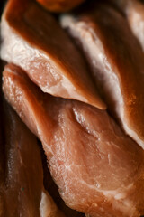 cut pork meat from the neck, soft pork meat on a cutting board