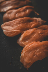Steaks on black background, food