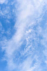 beautiful blue sky and white fluffy group of clouds with sunrise in the morning, natural background
