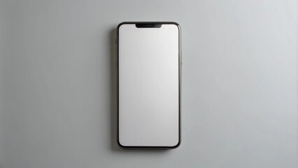 A sleek smartphone with a black frame and a blank white screen lies flat on a minimalist, light grey surface.