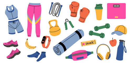 Colorful fitness gear and healthy snacks arranged for a workout session in a fitness studio