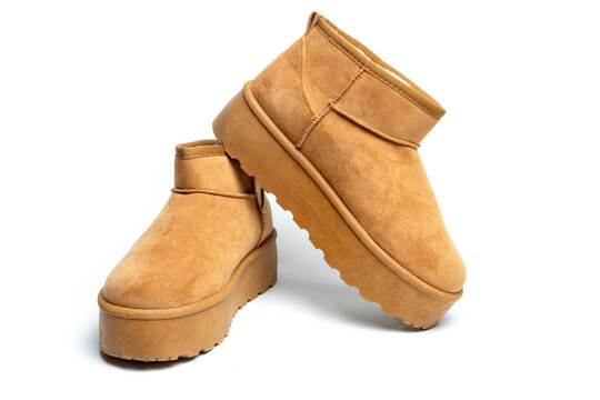 Womens Sheepskin boots isolated on white