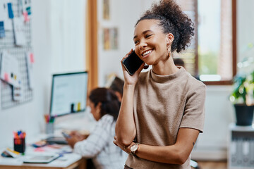 Woman, smile and phone call in creative office for startup, artist and talk for small business agency. Designer, discussion and art director happy with project, planning and entrepreneur goals