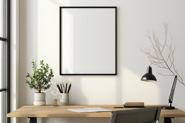 A minimalist workspace featuring a blank frame, desk, plants, and a lamp.