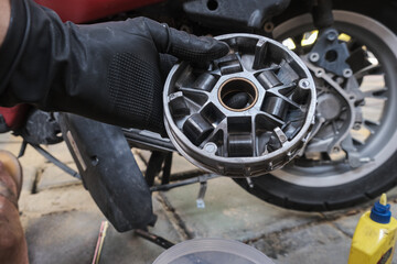 Mechanical working on automatic CVT transmission of scooter mortorcycle repair belt and clutch