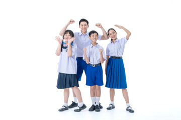 Obraz premium Group of Asian students wearing school uniforms on a white background. Girl and boy standing together friendly in Thailand students uniform.