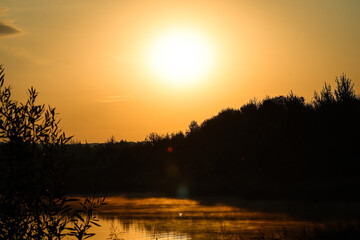golden sunrise on a summer lake